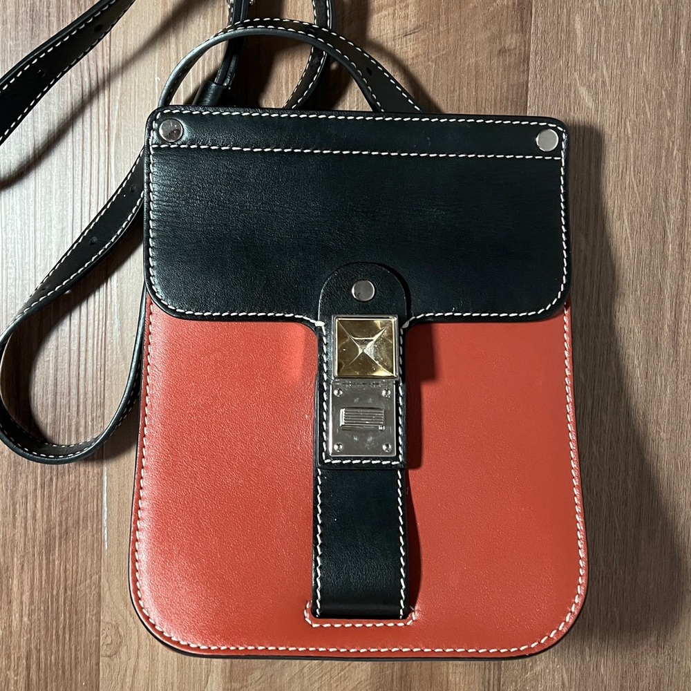 Proenza Schouler leather crossbody bag. Brownish Red and Black.